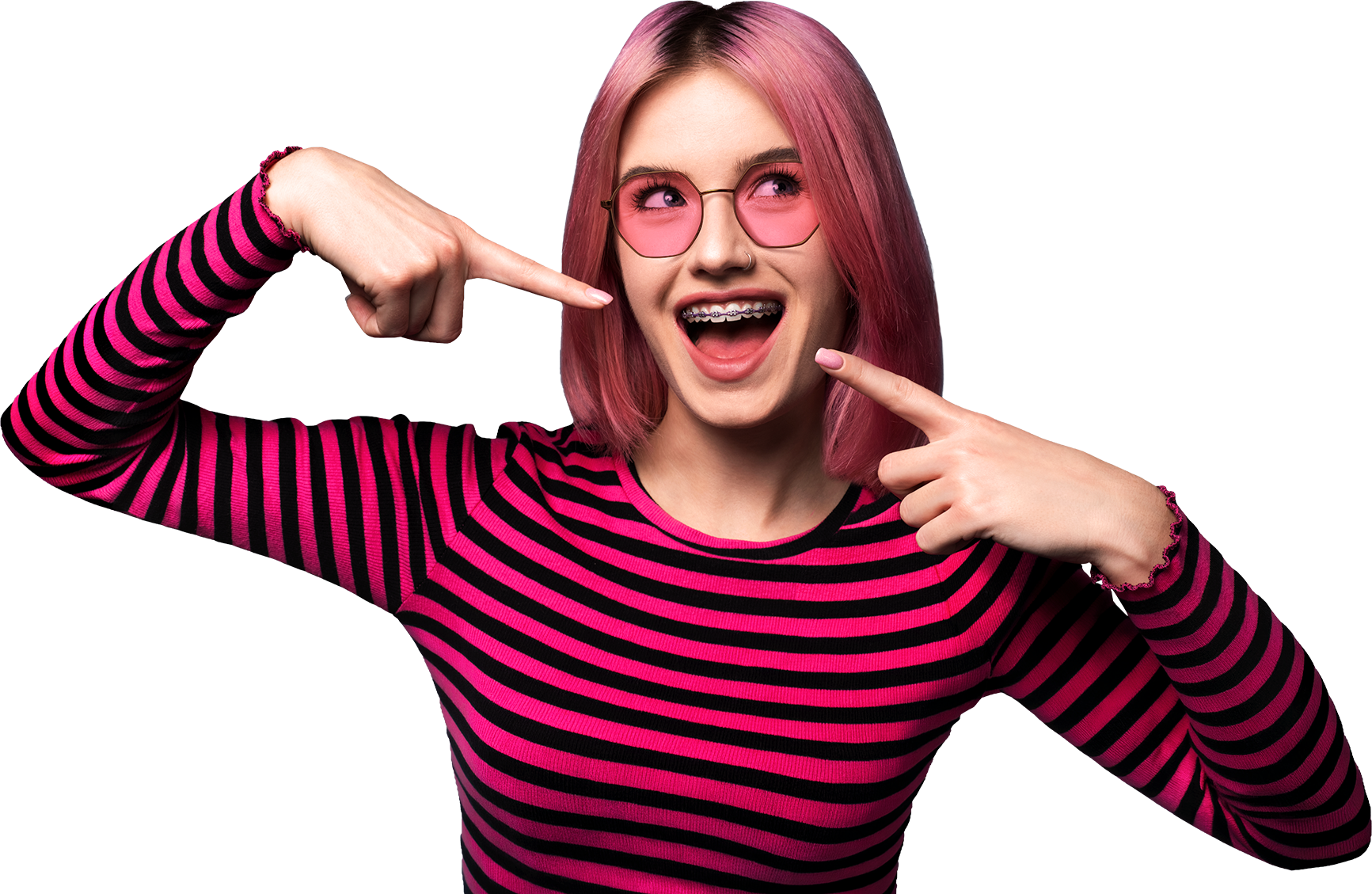 woman with braces pointing at smile