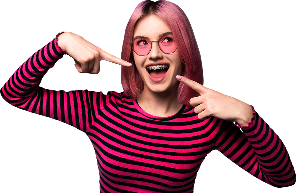 woman with braces pointing at smile